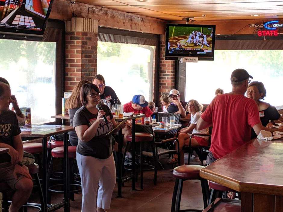 Person speaking in microphone for trivia game