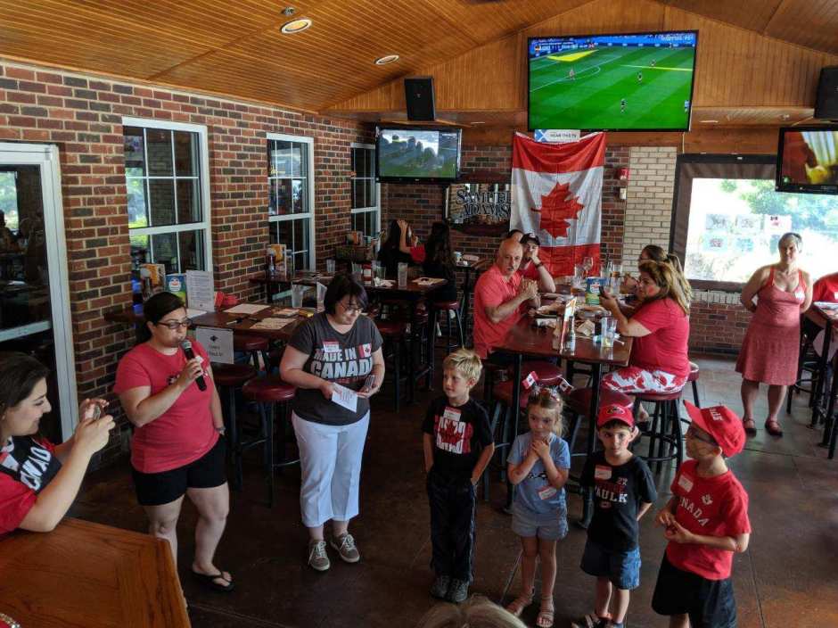 Person announcing result of drawing contest